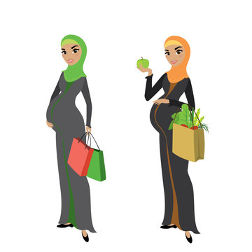 Two pregnant Muslim woman in traditional clothes