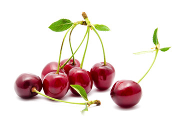 Juicy cherry with leaf isolated