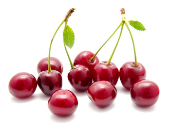 Juicy cherry with leaf isolated