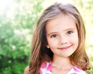 Portrait of adorable smiling little girl