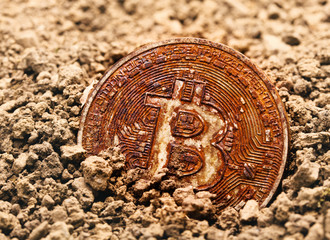  macro photograph of a coin representing the bitcoin cryptocurrency. Rusty, the concept of...