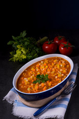 fish with vegetables in tomato sauce