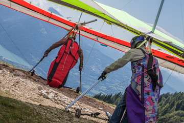 hang gliders taking off, mountain