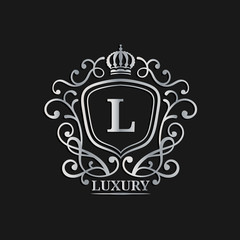 Vector monogram logo template. Luxury letter design. Graceful vintage character with crown illustration.