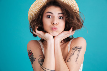 Close up of a happy smiling woman in straw hat