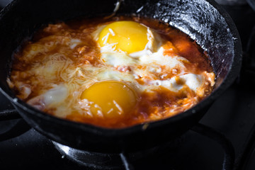 Fried eggs in tomato sauce (shakshuka)