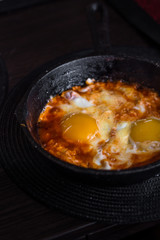 Fried eggs in tomato sauce (shakshuka)