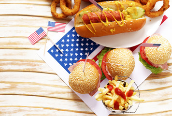 Traditional  hot dog, french fries and onion rings food for the celebration of July 4 -...