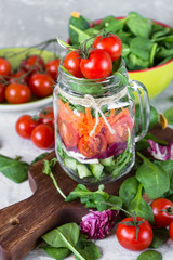 Fresh vegetarian salad in mason jar.