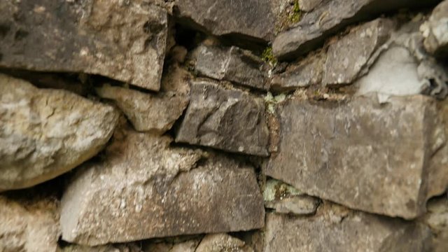 Stones of Wall Panorama of Protective Structure Ancient Architecture of Orthodox Male Cloister Manyava Skete in Foggy Day Sights of Western Ukraine