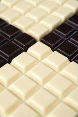Dark and white chocolate bars combined in a pattern