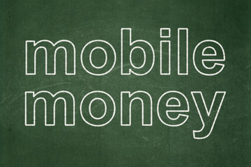 Obraz premium Banking concept: Mobile Money on chalkboard background