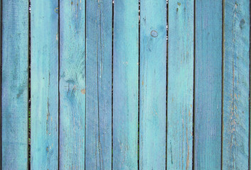 blue old wooden fence. wood palisade background. planks texture