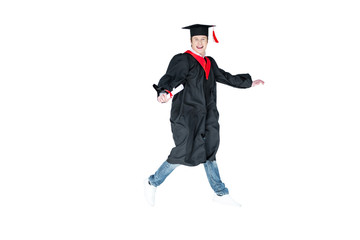 young student in graduation cap with diploma jumping isolated on white