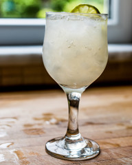 Daiquiri cocktail with lime and crushed ice.