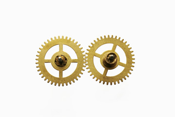 two metal round gear with teeth of the clock on the white isolated background