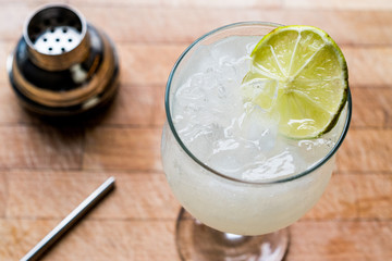 Daiquiri cocktail with lime and crushed ice.