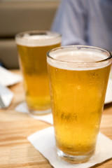 frozen glasses of beer on the table