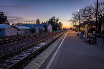 Train platform at sunrise - Merced, California, USA