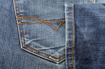 Pocket of jeans with yellow beads