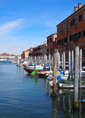 Fototapeta na wymiar Venice Moored boats on the canal in Guidecca