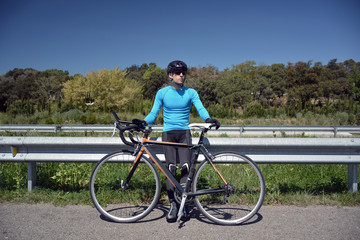 Obraz premium cyclist training on a lonely road