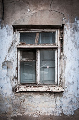 The old window in a collapsing house, A hammered old window in a collapsing house