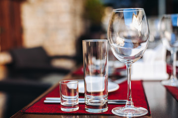 Served table. Three Glasses. Glass goblet