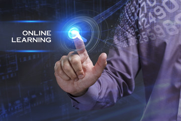 Business, Technology, Internet and network concept. Young businessman working on a virtual screen of the future and sees the inscription: Online learning