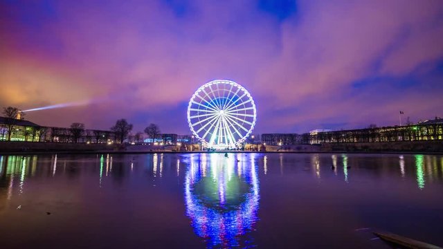 paris night famous ferris wheel tuileries garden pond panorama 4k time lapse france
