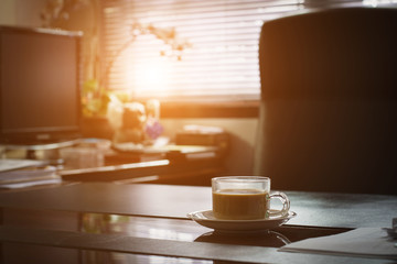 Coffee on desk in office,selective focus.