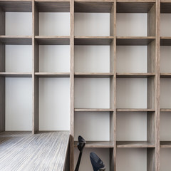 Empty office with fitted bookshelf