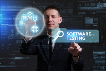 Business, Technology, Internet and network concept. Young businessman working on a virtual screen of the future and sees the inscription: Software testing