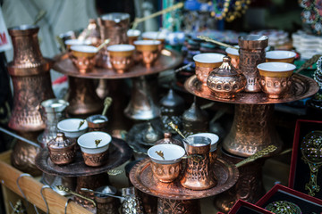 Traditional handcrafted copper coffee pots in souvenir shop in Sarajevo