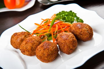 Eating fast food, on a plate