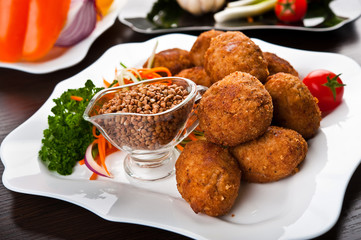 Eating fast food, on a plate