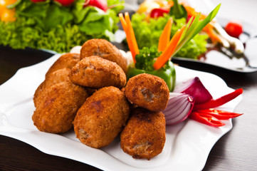 Eating fast food, on a plate