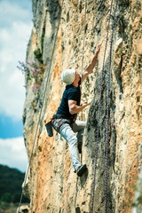 Rock climbing.