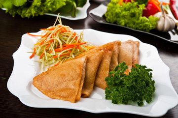 Eating fast food, on a plate