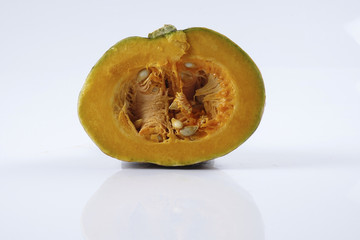 Sweet orange pumpkin isolated on white.