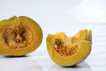 Sweet orange pumpkin isolated on white.