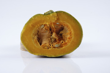 Sweet orange pumpkin isolated on white.