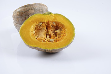 Sweet orange pumpkin isolated on white.