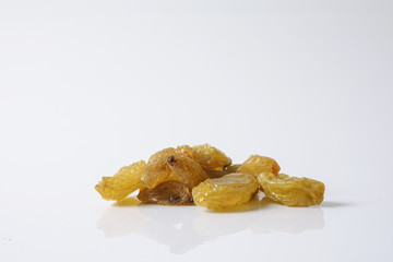 Dates and raisin isolated on white.