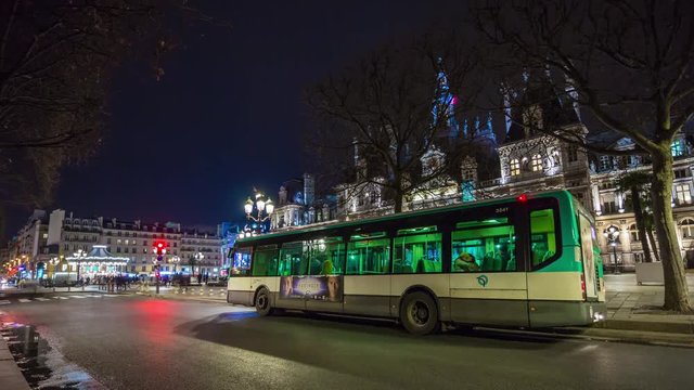 night illuminated paris famous hotel de ville traffic street view 4k time lapse france
