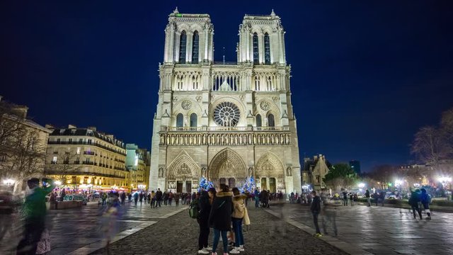 night illumination famous notre-dame de paris crowded square panorama 4k time lapse france
