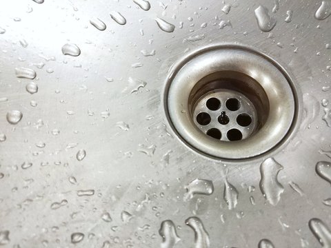 Selective focus of silver sink, With place your text