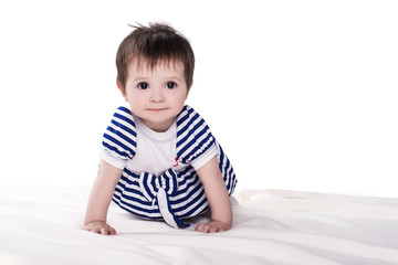 Fototapeta premium little baby girl crawling on floor, isolated on white