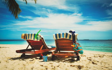 Two beach chairs on tropical vacation