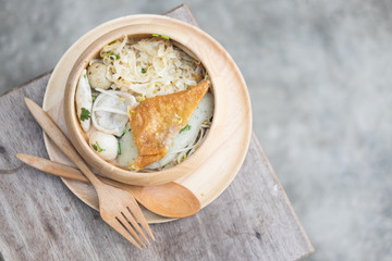 Chinese egg noodle topping pork ball and dumpling
